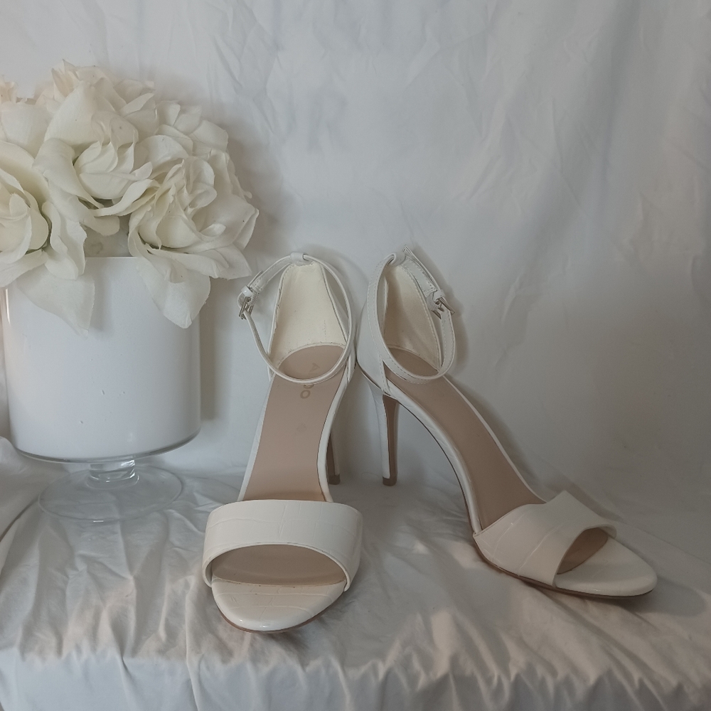 Aldo white heels.